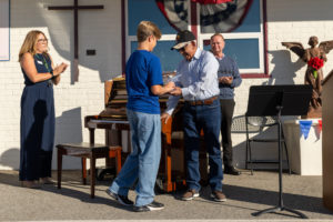 Each veteran was given a gift of a blessed rosary and the St. Michael the Archangel prayer during a Veterans Day event at Holy Angels School in Arcadia on Nov. 10. (Lawrence Lane)