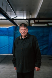 Msgr. Terrance Fleming, executive director of Adopt a Family LA, poses during the annual gift distribution event on Dec. 13 at the Cathedral of Our Lady of the Angels. (Peter Lobato)