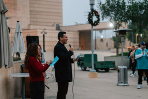 Father Michael Mesa addresses volunteers during the annual Adopt-a-Family LA  gift distribution event on Dec. 13 at the Cathedral of Our Lady of the Angels. (Peter Lobato)