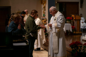 Faithful were invited to receive the Anointing of the Sick during the Jan. 7 healing Mass at Sacred Heart Church. (John Rueda)