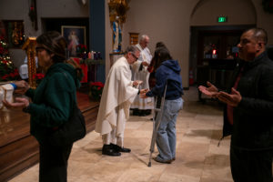 Faithful were invited to receive the Anointing of the Sick during the Jan. 7 healing Mass at Sacred Heart Church. (John Rueda)