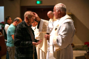 Faithful were invited to receive the Anointing of the Sick during the Jan. 7 healing Mass at Sacred Heart Church. (John Rueda)
