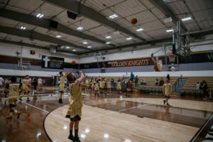 Game action as the Capuchin Franciscans play against the seminarians in the Archdiocese of Los Angeles' annual priests vs. seminarians basketball game, this year on Jan. 18 at St. Francis High School in La Cañada Flintridge. (John Rueda)