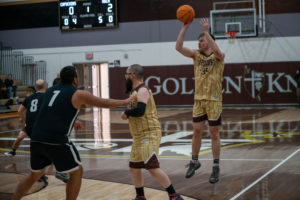 Game action as the Capuchin Franciscans play against the seminarians in the Archdiocese of Los Angeles' annual priests vs. seminarians basketball game, this year on Jan. 18 at St. Francis High School in La Cañada Flintridge. (John Rueda)