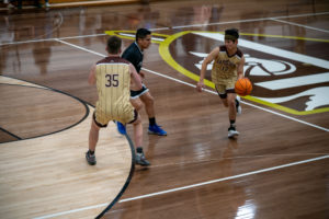 Game action as the Capuchin Franciscans play against the seminarians in the Archdiocese of Los Angeles' annual priests vs. seminarians basketball game, this year on Jan. 18 at St. Francis High School in La Cañada Flintridge. (John Rueda)