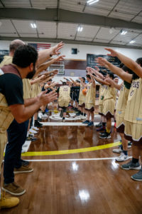 The Capuchin Franciscan members get introduced in their basketball game against the LA seminarians on Jan. 18 at St. Francis High School in La Cañada Flintridge. (John Rueda)