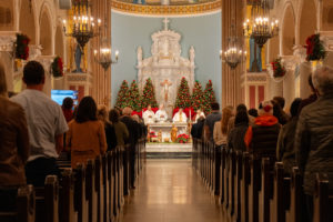 Parishioners attend St. Monica Church in Santa Monica during a Jan. 7 Mass on the one-year anniversary of the Palisades Fire that burned down Corpus Christi Church. (Elizabeth Friedrich)