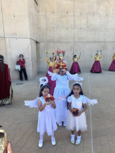 Young people carry statues of Santo Niño in the outdoor plaza of the Cathedral of Our Lady of the Angels prior to a special Mass on Jan. 18. (Carolina Guevara) 