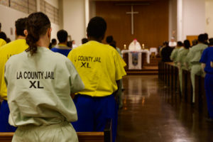 Auxiliary Bishop Matt Elshoff celebrates Christmas Day Mass with inmates at Men’s Central Jail near downtown LA. (Reese Cuevas)