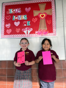 First-graders Valentina Avila and Elia Barba pose during Catholic Schools Week at Santa Rosa de Lima School in San Fernando. (Santa Rosa de Lima School)