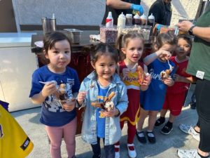 Young people enjoy churros at St. Francis Xavier School in Burbank sing during Catholic Schools Week. (St. Francis Xavier School)