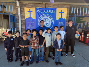 Students at St. Paul of the Cross School in La Mirada dressed up like Coach Angel, top center, during Catholic Schools Week. (St. Paul of the Cross School)