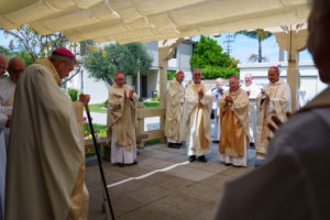 Bishop Edward Clark is applauded by Archbishop José H. Gomez and other bishops and priests at a Mass at St. Maria Goretti in Long Beach March 28 celebrating Clark's 25th anniversary of episcopal ordination. (Peter Lobato)