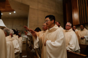 The hundreds of priests in the Archdiocese of Los Angeles who attended the Cathedral of Our Lady of the Angels help bless the holy oils during the Chrism Mass on March 30. (Peter Lobato)