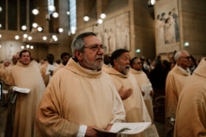 Priests in the Archdiocese of Los Angeles process into the Cathedral of Our Lady of the Angels during the Chrism Mass on March 30. (Peter Lobato)