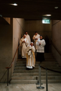 Archbishop José H. Gomez carries the holy Eucharist to the chapel below the Cathedral of Our Lady of the Angels during the Mass of the Lord's Supper on April 2. (Peter Lobato)