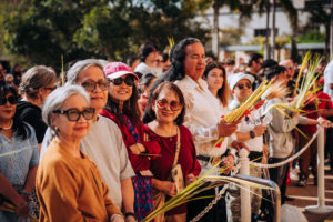 Attendees hold their palms prior to the Palm Sunday Mass on March 29 at the Cathedral of Our Lady of the Angels. (Isabel Cacho)
