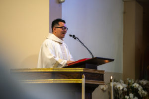 Father Shengda (Martin) Zhu offers the homily during his first Mass at his home parish of St. Thomas Aquinas Church in Monterey Park on May 31. (John Rueda)