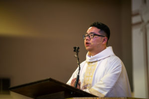 Father Shengda (Martin) Zhu offers the homily during his first Mass at his home parish of St. Thomas Aquinas Church in Monterey Park on May 31. (John Rueda)