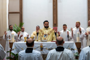 Father David Zamora prays during his first Mass at his home parish of Sacred Heart Church in Lancaster on May 31. (Katie Trejo)