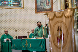Venezuelan priest Father Alexander Hernandez, CSsR, celebrates a Mass for victims of the Venezuela earthquakes Sunday, June 28, at Nuestra Señora de Guadalupe Church in East LA. (John Geronilla)