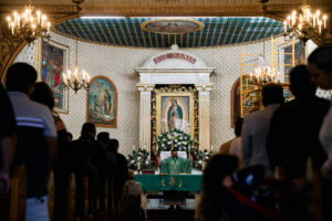 Parishioners attend a special Mass at Nuestra Señora de Guadalupe Church in East LA on Sunday, June 28, to pray for victims of the Venezuela earthquakes. (John Geronilla)