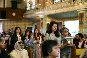 Parishioners take up gifts to be blessed during a special Mass at Nuestra Señora de Guadalupe Church in East LA on Sunday, June 28, to pray for victims of the Venezuela earthquakes. (John Geronilla)