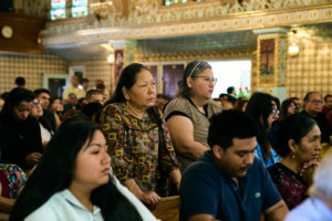 Parishioners attend a special Mass at Nuestra Señora de Guadalupe Church in East LA on Sunday, June 28, to pray for victims of the Venezuela earthquakes. (John Geronilla)