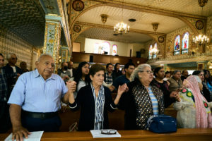 Parishioners attend a special Mass at Nuestra Señora de Guadalupe Church in East LA on Sunday, June 28, to pray for victims of the Venezuela earthquakes. (John Geronilla)