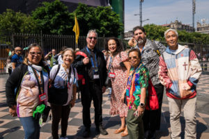 Pilgrims pose with LA Auxiliary Bishop Marc Trudeau outside the Mexico City Metropolitan Cathedral on July 10. (Isabel Cacho)