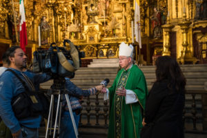 Archbishop José  H. Gomez speaks to media members following Mass at the Mexico City Metropolitan Cathedral on July 10. (Isabel Cacho)
