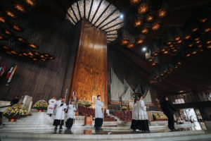 A procession begins a special Mass at the Basilica of Our Lady of Guadalupe in Mexico City on July 11. (Isabel Cacho)