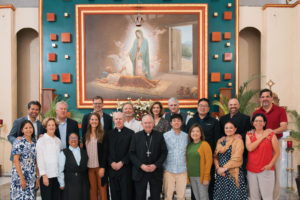 Archbishop José  H. Gomez poses with pilgrims inside the Sanctuary of the Fifth Guadalupan Apparition in Tulpetlac, Mexico, on July 12. (Isabel Cacho)