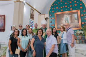Archbishop José  H. Gomez poses with pilgrims inside the Sanctuary of the Fifth Guadalupan Apparition in Tulpetlac, Mexico, on July 12. (Isabel Cacho)