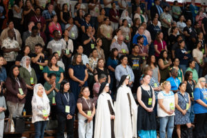 Participants pray during the Welcome Back Mass on Aug. 5 at Cantwell-Sacred Heart of Mary High School in Montebello. (Poncho Romero)