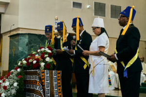 The Knights of Peter Claver pray over the cremated remains of Deacon Hosea Alexander during the Aug. 14 funeral Mass at Holy Name of Jesus Church in Los Angeles. (John Geronilla)