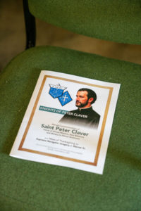 A program sits during the Sept. 6 Mass of Thanksgiving at Transfiguration Church for Greg Warner Sr.’s election as supreme navigator of the national Knights of Peter Claver. (John Rueda)