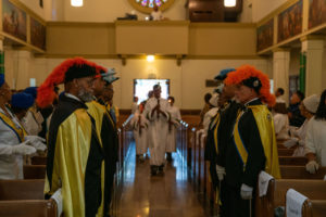 Fourth degree Knights of Peter Claver from Los Angeles lead the honor guard at the Sept. 6 Mass of Thanksgiving at Transfiguration Church for Greg Warner Sr.’s election as supreme navigator of the national Knights of Peter Claver. (John Rueda)