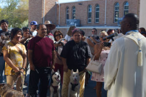 Father Chidi Ekpendu, pastor at St. Francis of Assisi Church in Silver Lake, celebrates the parish patron’s feast day with a special “Blessing of the Animals” after a special Mass and parish potluck on Oct. 4. (John Geronilla)